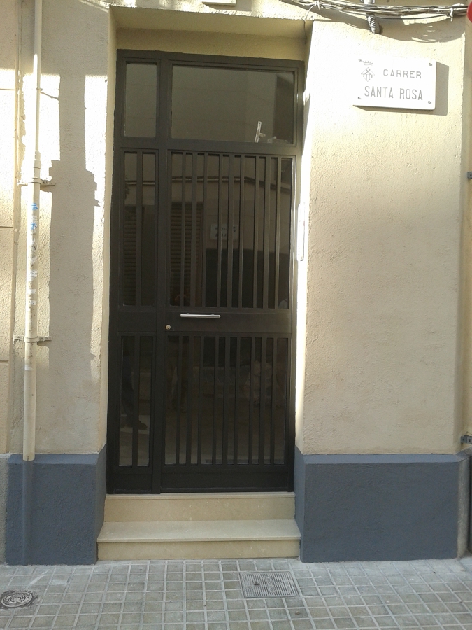 Reforma completa portería comunidad.