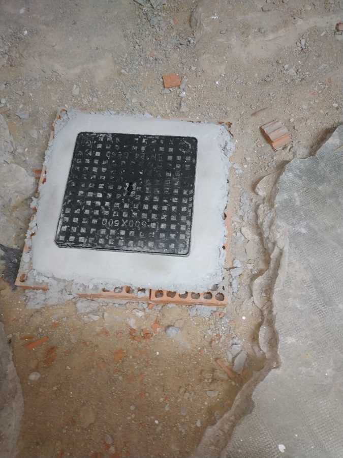 nueva arqueta con tapa de hierro fundido