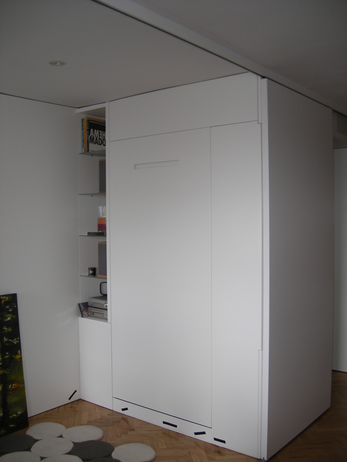 panelados que forman habitacion y cama oculta