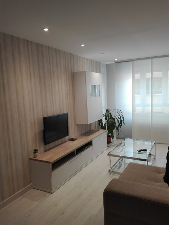 Papel pintado y mueble TV