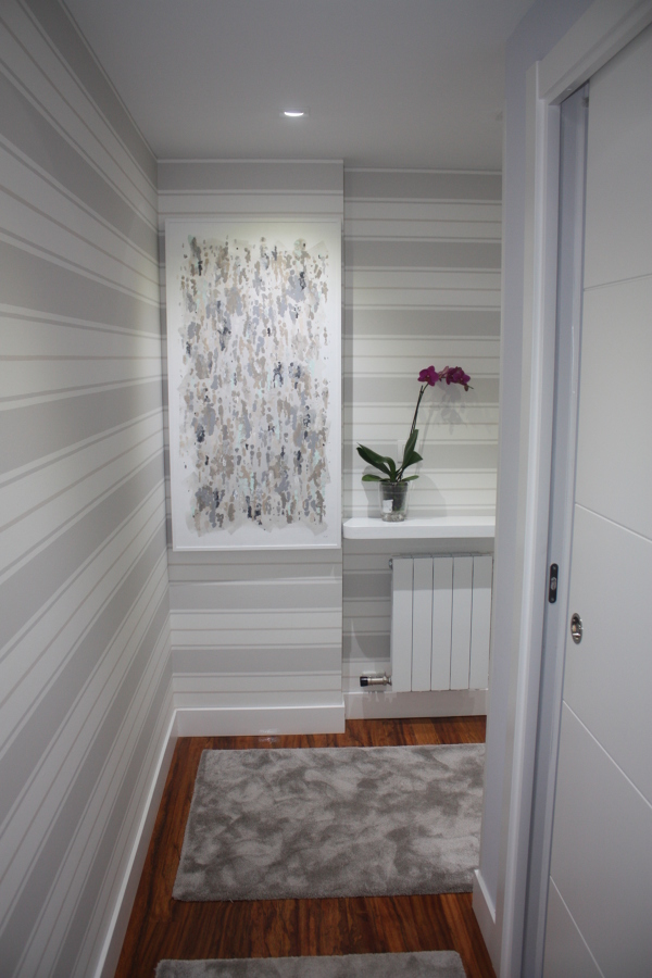 Parte del hall que se ve desde el pasillo