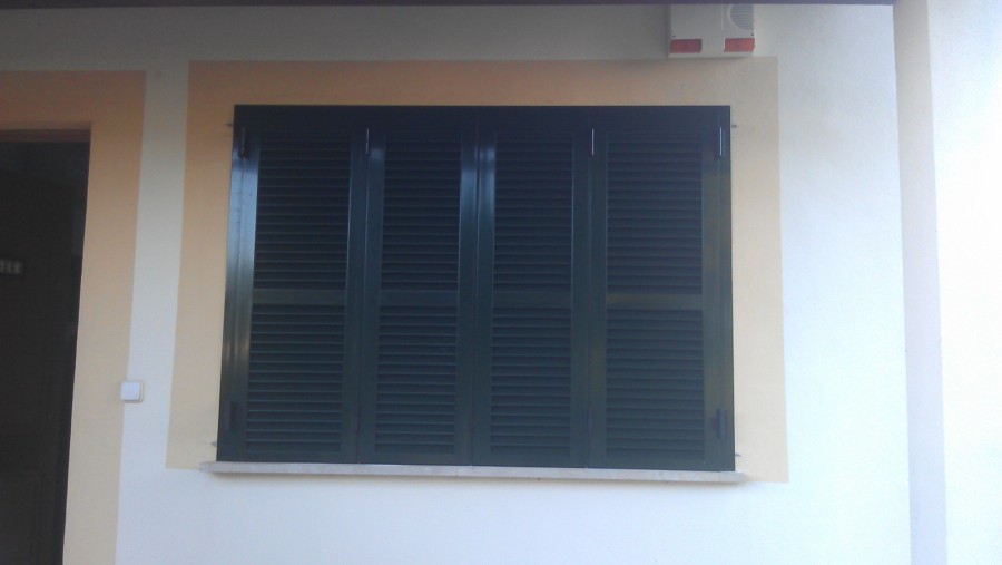 Persiana de cuatro hojas 
