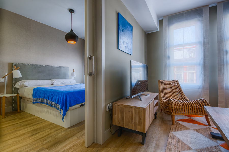 Perspectiva salón y dormitorio