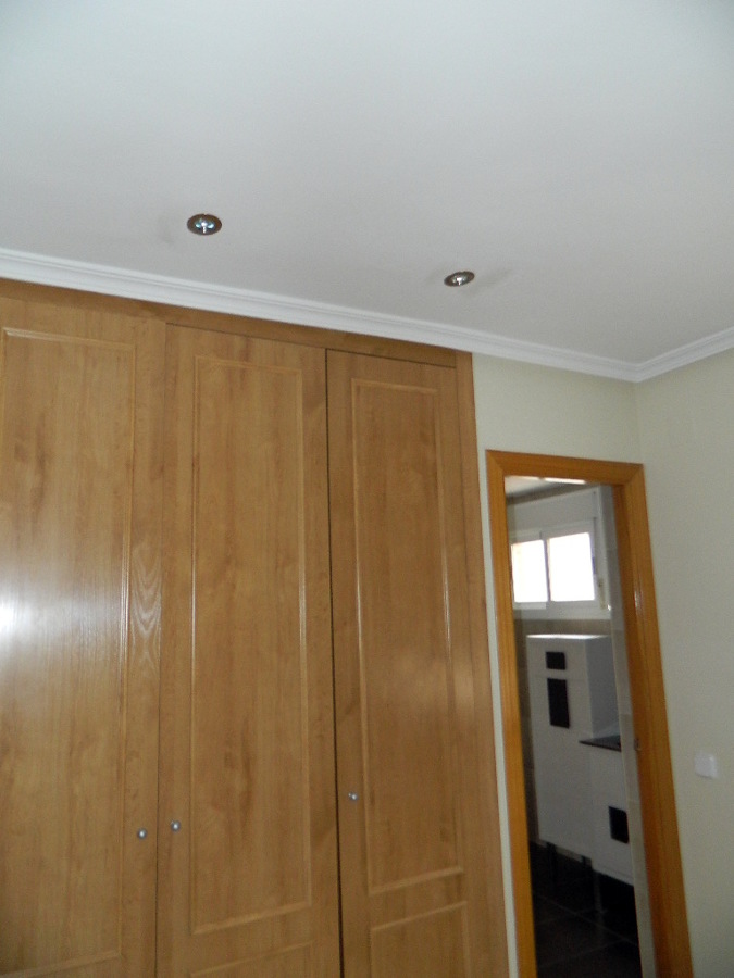 pintado de vivienda y moldura de escayola