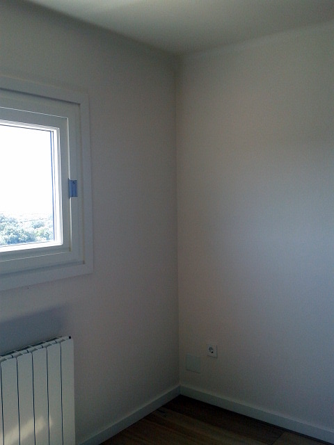 Pintado e instalación del parquet.