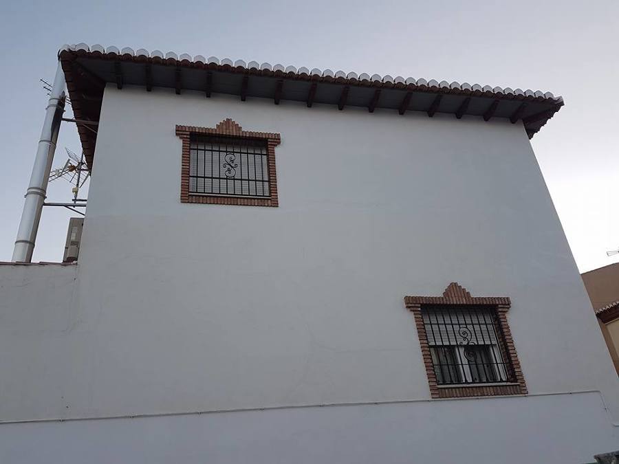 Pintura en cartabón y rejas