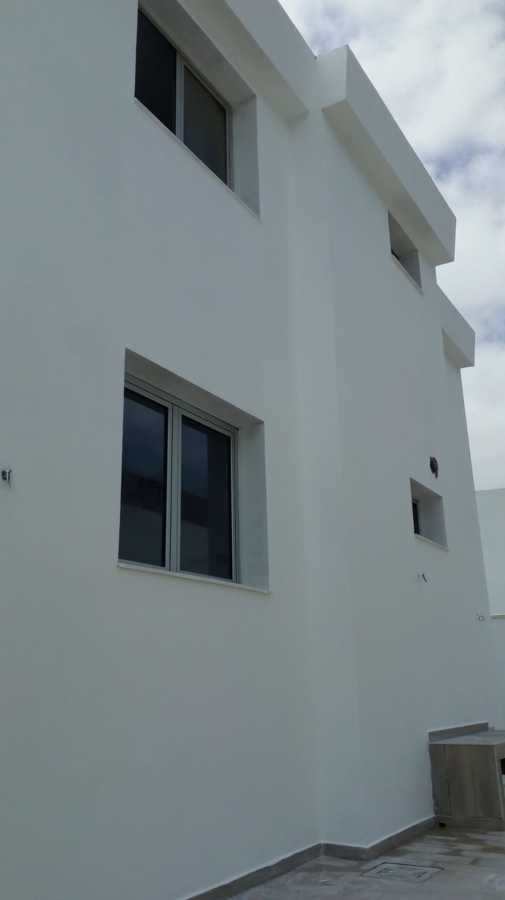 Pintura exterior de fachada pared lateral