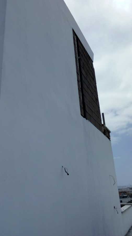 Pintura exterior de fachada pared lateral