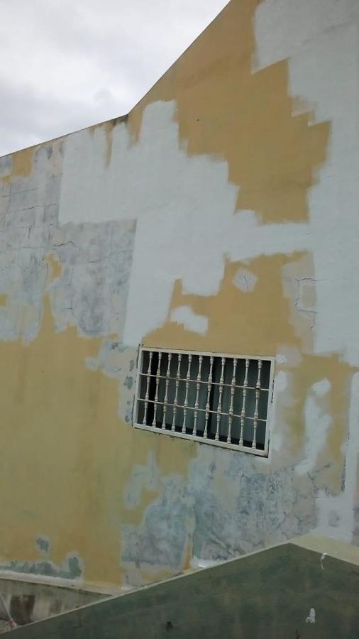 pintura exterior de fachada pared lateral