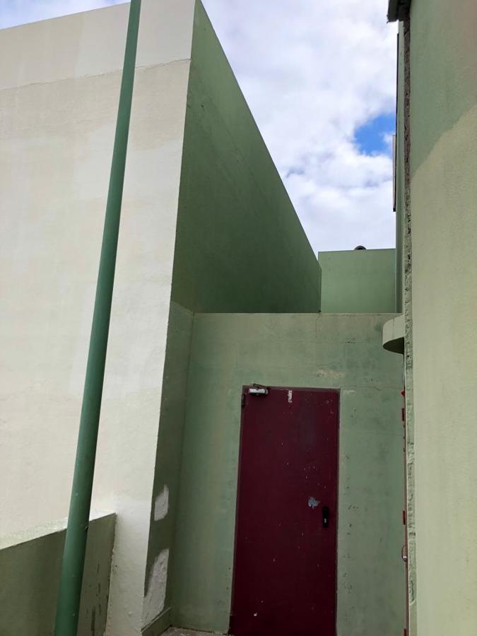 pintura exterior de fachada paredes traseras