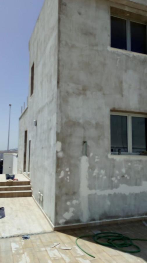 Pintura exterior de fachada, preparación de paredes y superficies