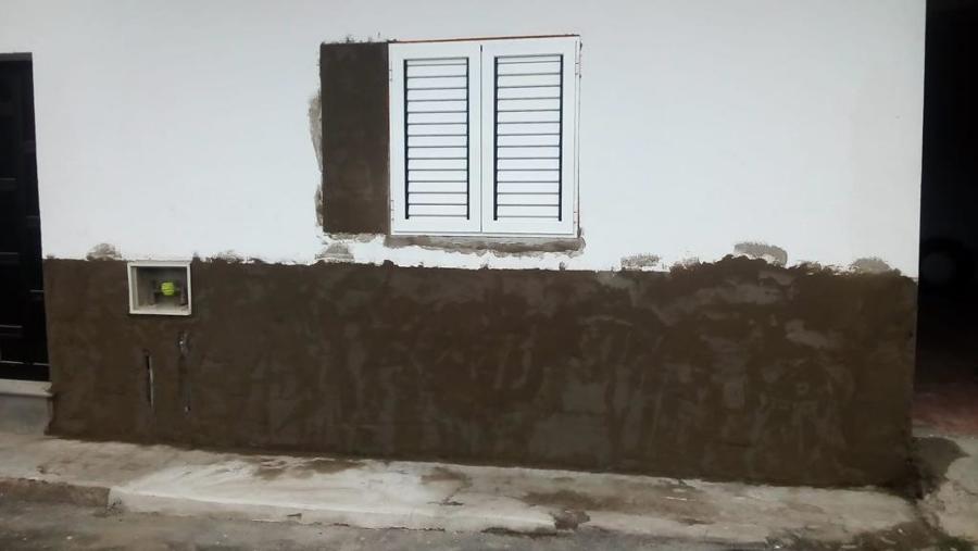 pintura exterior de fachada y colocación de plaquetas