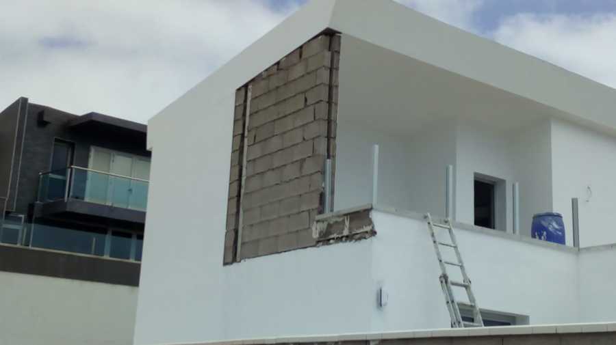 Pintura exterior de fachada y muros de alrededores