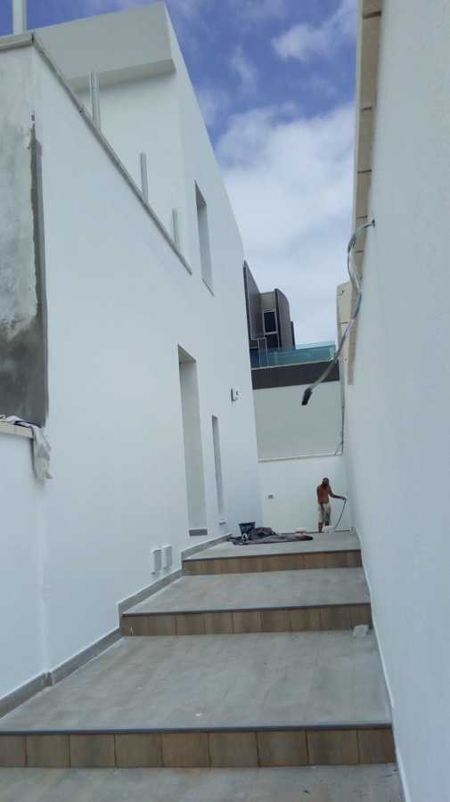 Pintura exterior de fachada y muros de alrededores