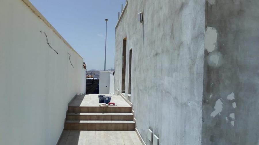 Pintura exterior de fachada y muros de alrededores