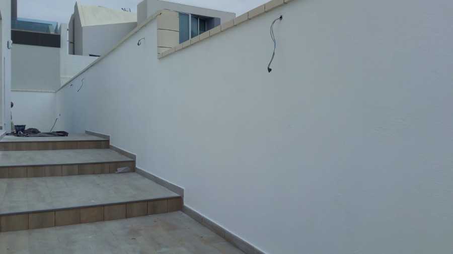 Pintura exterior de fachada y muros del alrededores