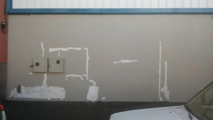 pintura exterior de nave industrial reparación de superficies