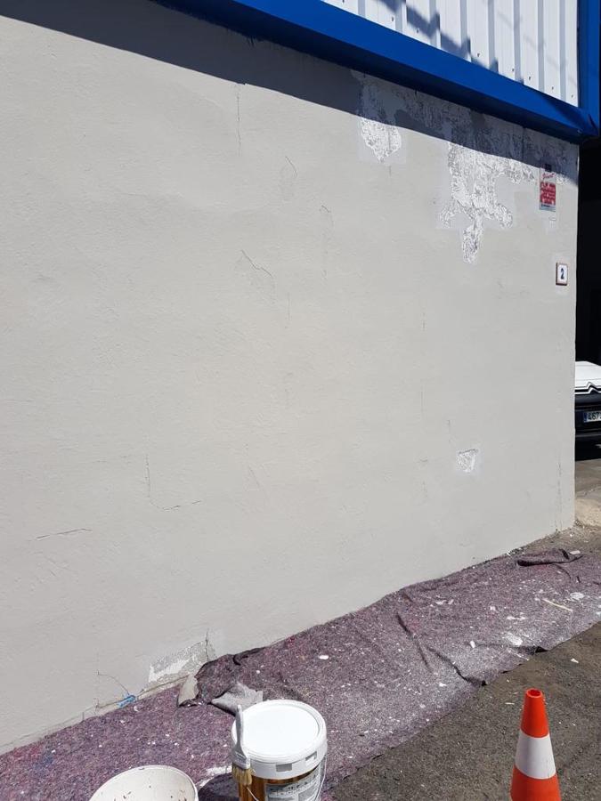 pintura exterior de nave industrial reparación de superficies