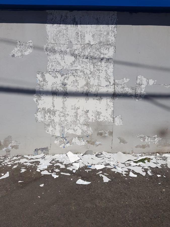 pintura exterior de nave industrial reparación de superficies