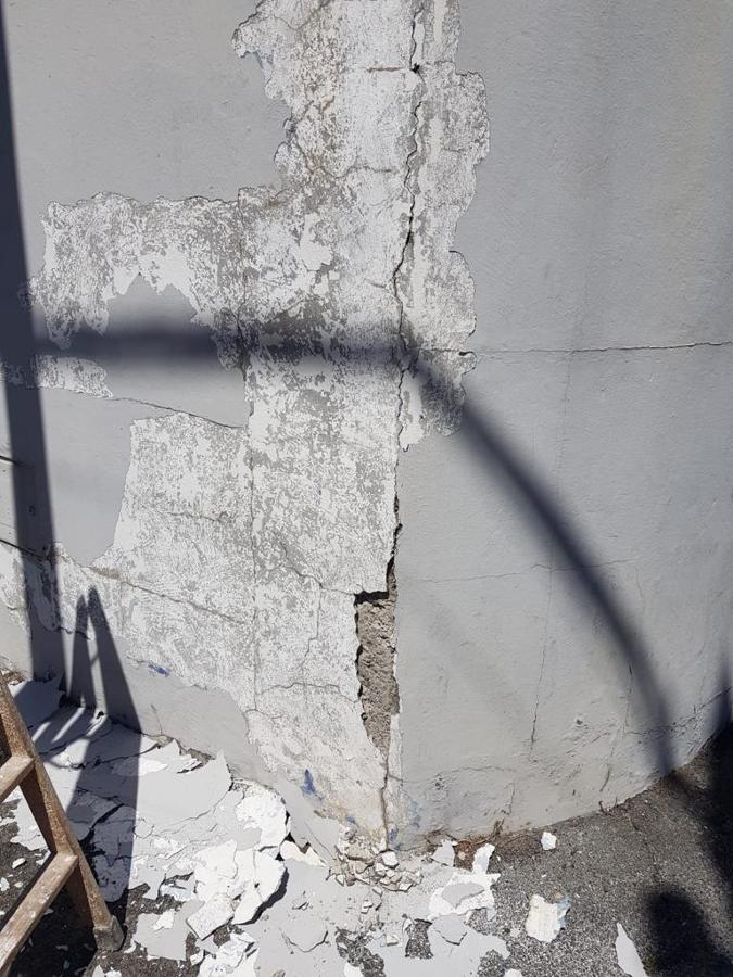 pintura exterior de nave industrial reparación de superficies