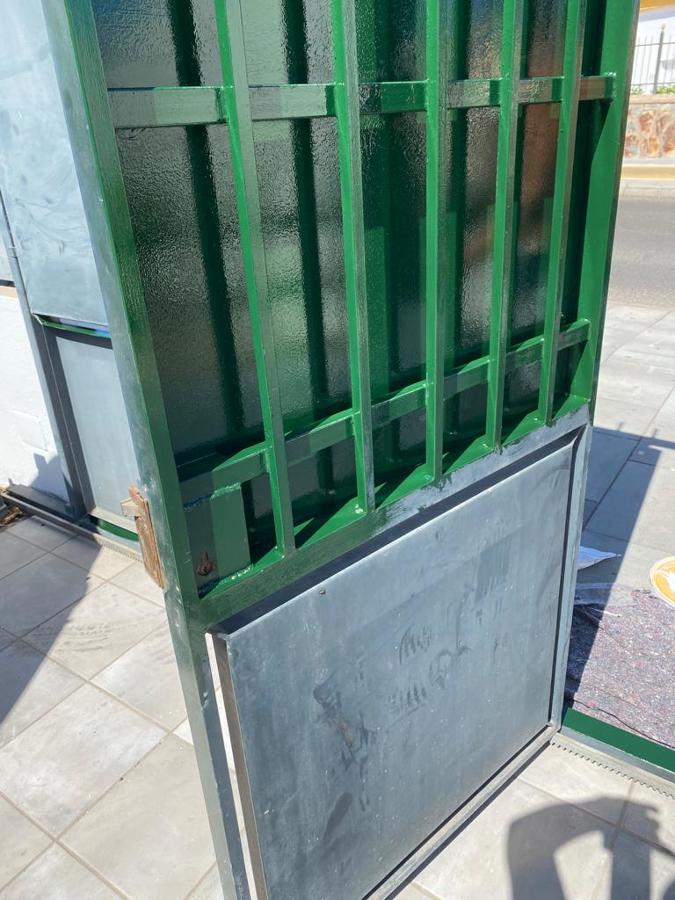 Pintura exterior de vivienda puerta