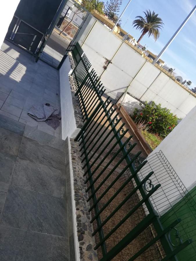 Pintura exterior de vivienda vallas