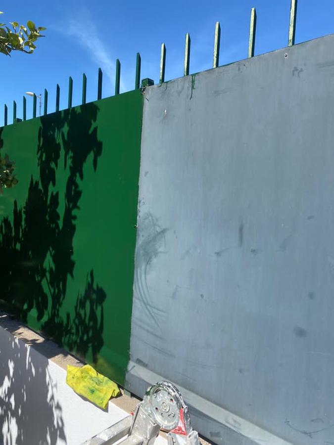 Pintura exterior de vivienda vallas metálicas