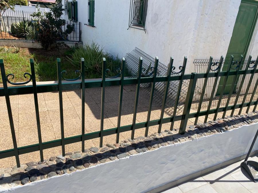 Pintura exterior de vivienda vallas y rejas metálicas