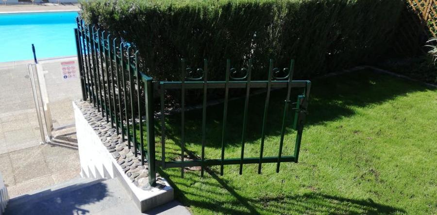 Pintura exterior de vivienda y zonas comunes rejas