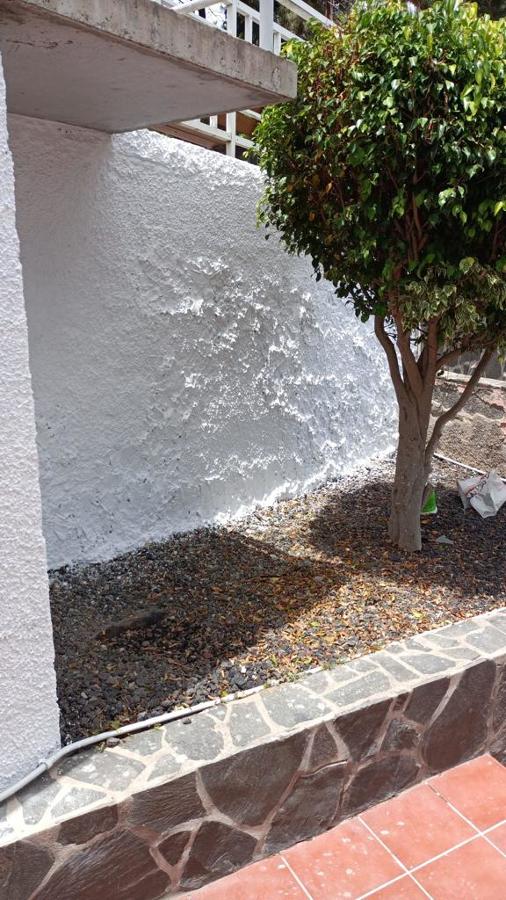 Pintura exterior zonas comunes muros centro comercial Tafira