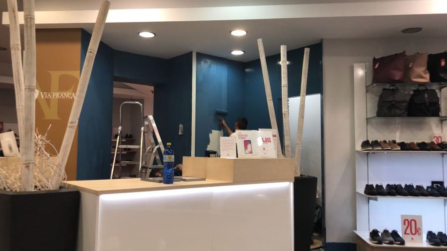 Pintura fondo mostrador interior local comercial