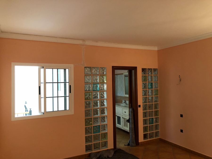 Pintura interior de vivienda dormitorio