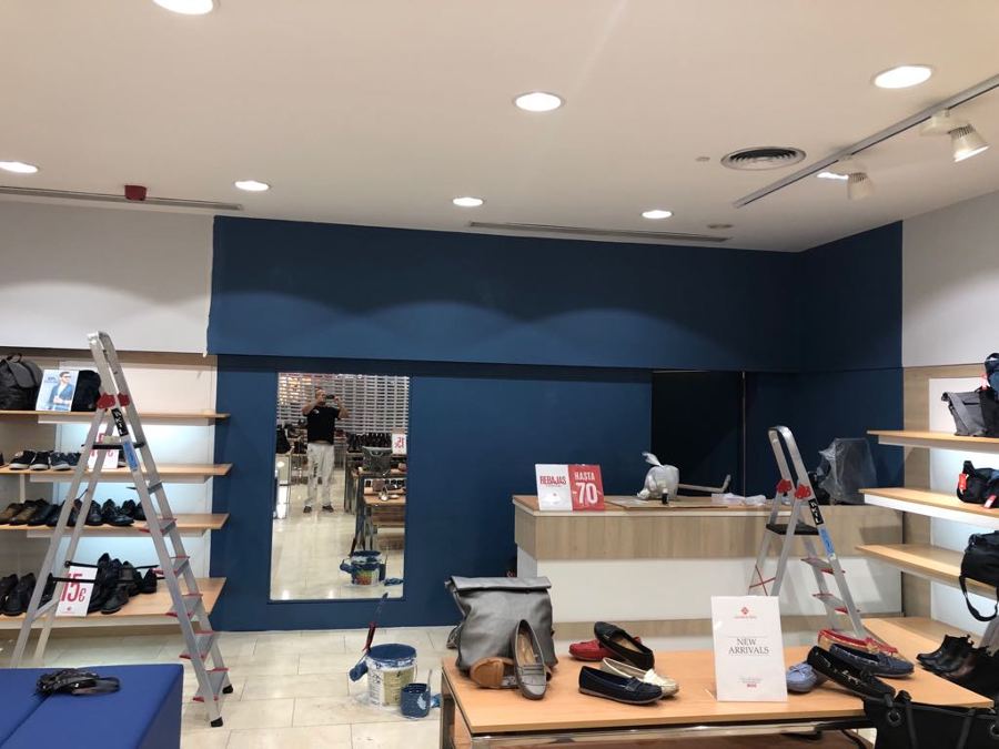 Pintura interior fondo mostrador local comercial