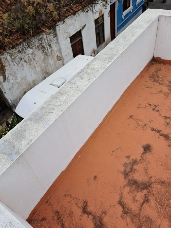 Pintura y reparación de muros azotea