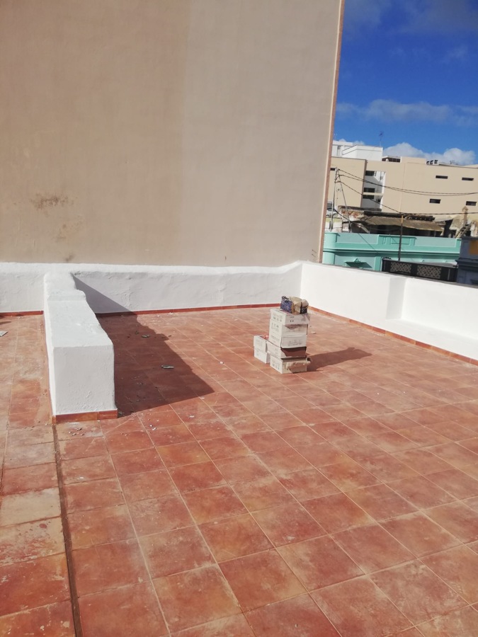 pintura y reparación de pretiles y muros en cubierta de azotea