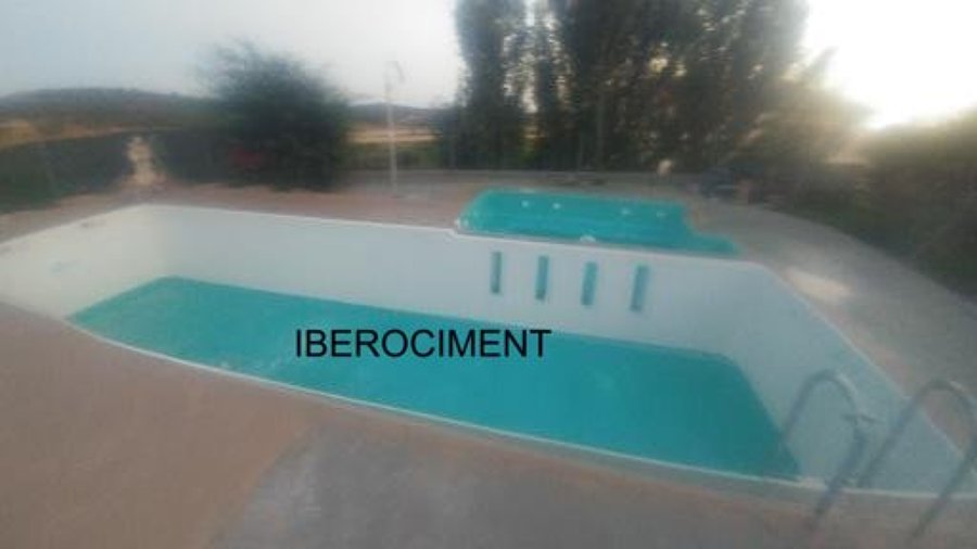 PISCINA CON MICROCEMENTO