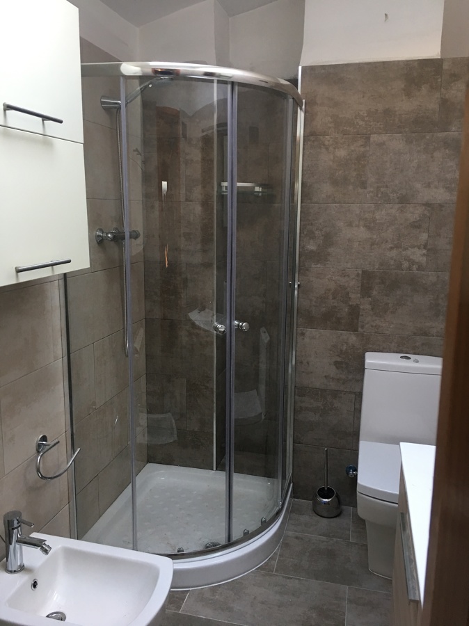 Plato de ducha media luna 