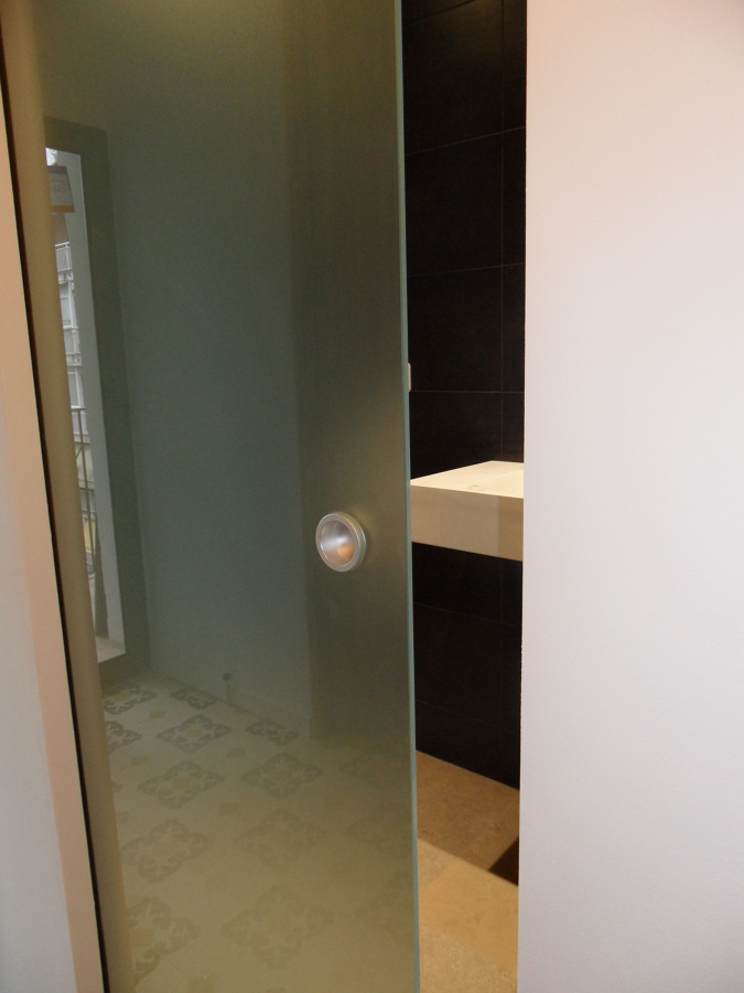 Puerta corredera de cristal