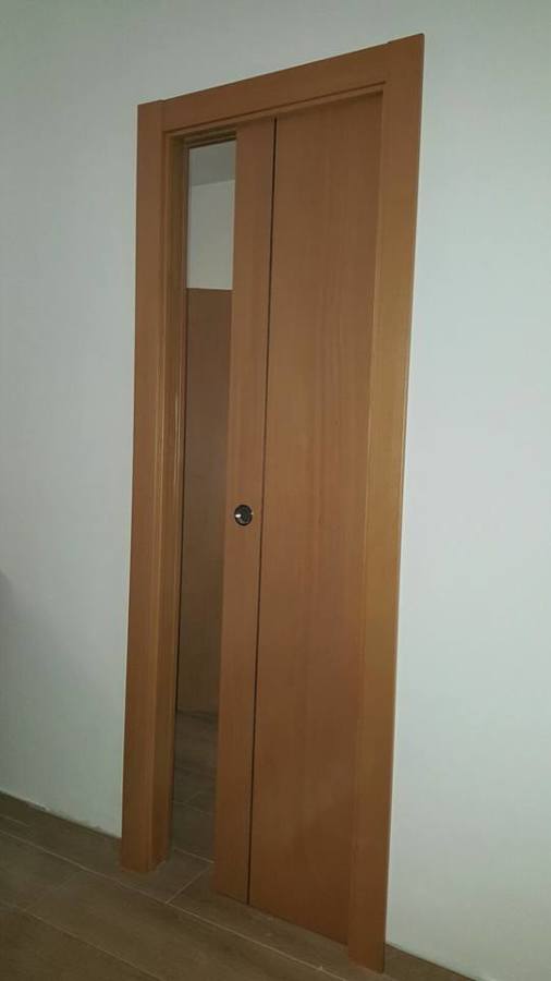 PUERTA CORREDERA HAYA VAPORIZADA.