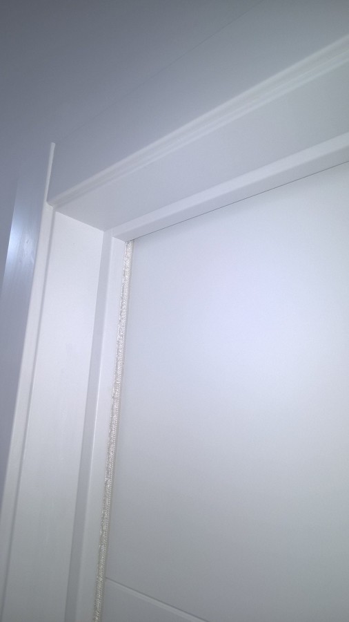 Puerta corredera lacada en blanco