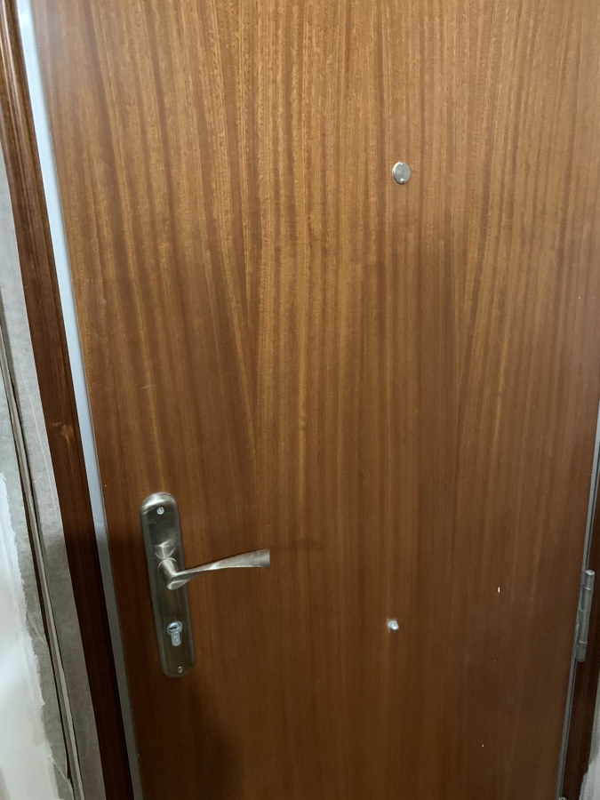 PUERTA ENTRADA ANTES DE PANELARLA POR DENTRO