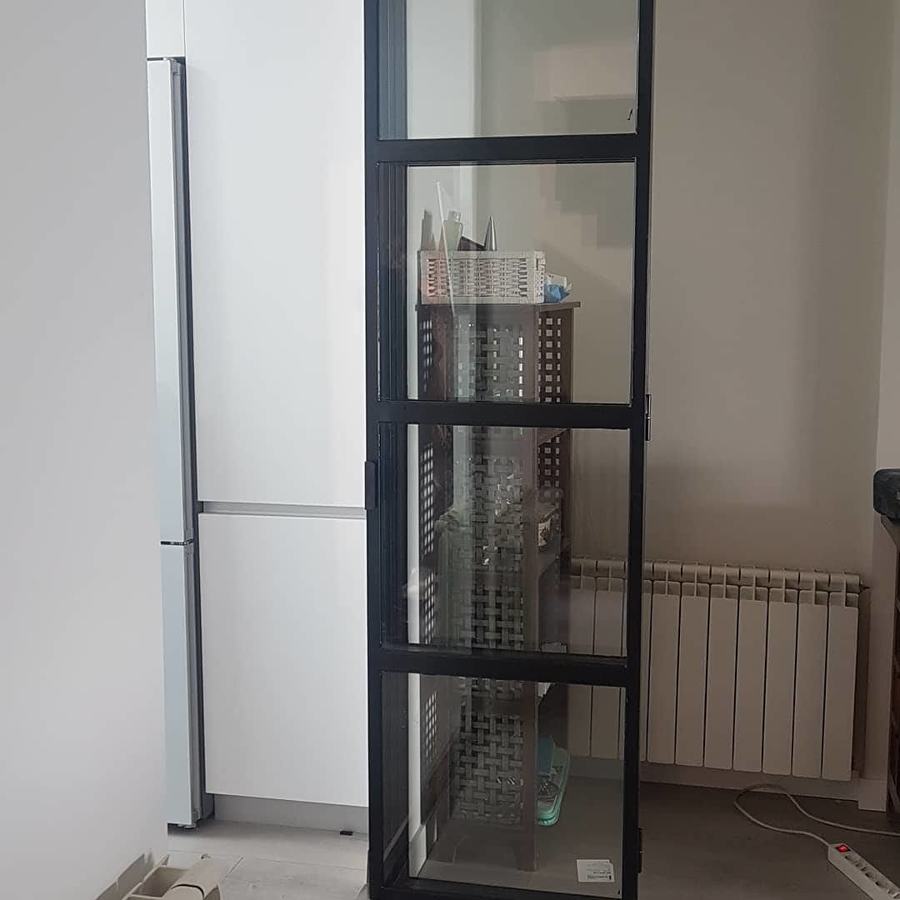 PUERTA PLEGABLE ABIERTA