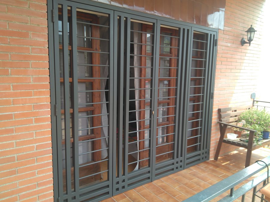 Puerta plegable de 4 hojas