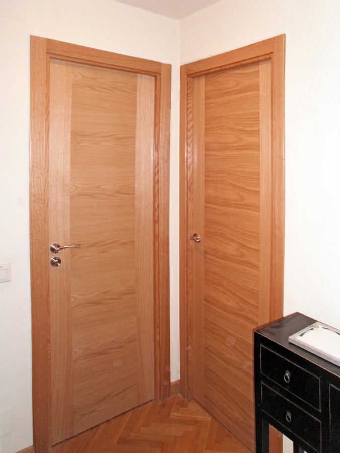 Puertas abatibles en roble.