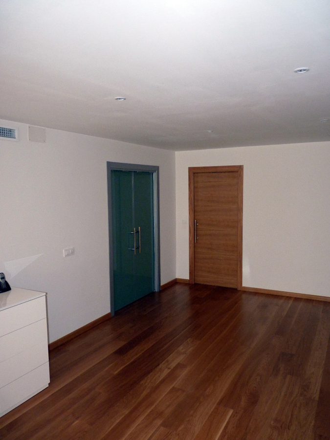 Puertas correderas de cristal y de madera de roble