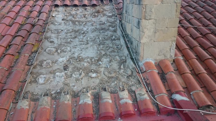 QUITADA DE LAS TEJAS Y LIMPIEZADEL AREA DE TRABAJO