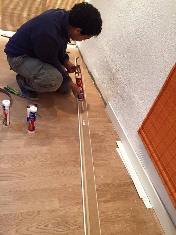 reconstrucción de rodapié con cemento y posterior colocación