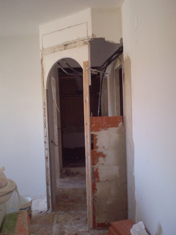 Reconstruir arco de la puerta del salon