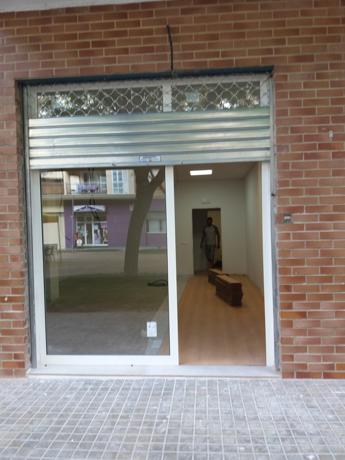 Reforma Parafarmacia  instalación parket