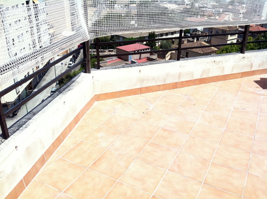 REHABILITACION DE TERRAZA CON MATERIAL IMPERMEABLE TRANSPARENTE Y TRANSITABLE